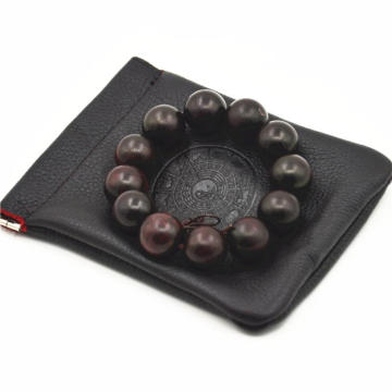 Single pull portable leather gift pouch